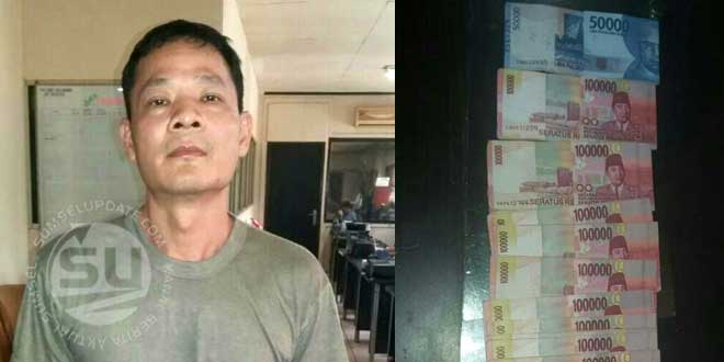 Tersangka Bong Tjeng Fuk alias Yanto saat diamankan di Polresta Palembang