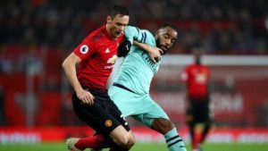 Manchester United berimbang kontra Arsenal.