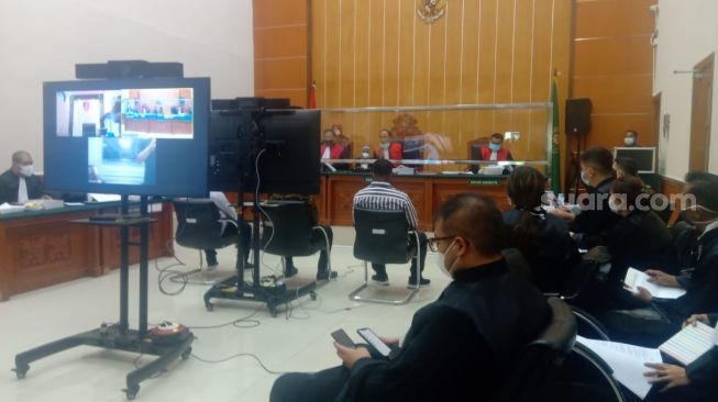 Sidang lanjutan kasus penganiayaan dan pembunuhan atas terdakwa John Kei