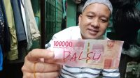 Uang palsu