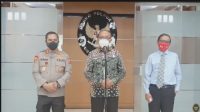 Wakil Ketua LPSK Achmadi (tengah)