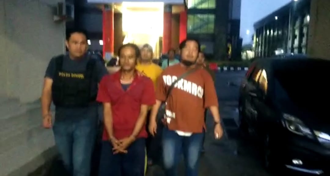 Acong saat diamankan polisi