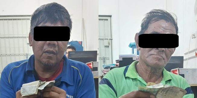 Pelaku pungli Kedua pelaku pungli saat diamankan