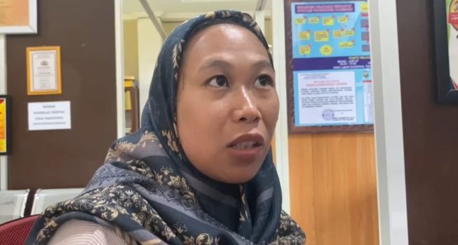 Febrina Sari (32) saat membuat laporan polisi Febrina Sari (32) saat membuat laporan polisi