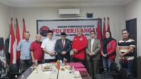 Heri Amalindo, mengembalikan formulir pendaftaran calon Gubernur Sumsel